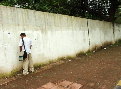 Road side standing peeing Inmarathi