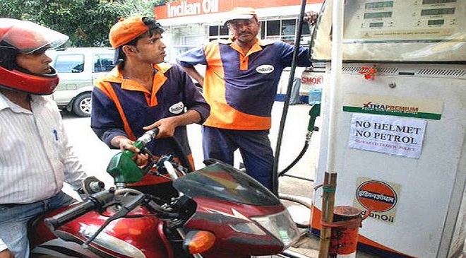 man filling petrol bike InMarathi